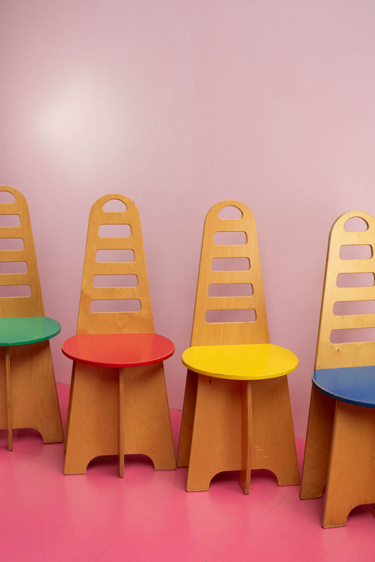 Set van 4 stoelen met gekleurd zitvlak